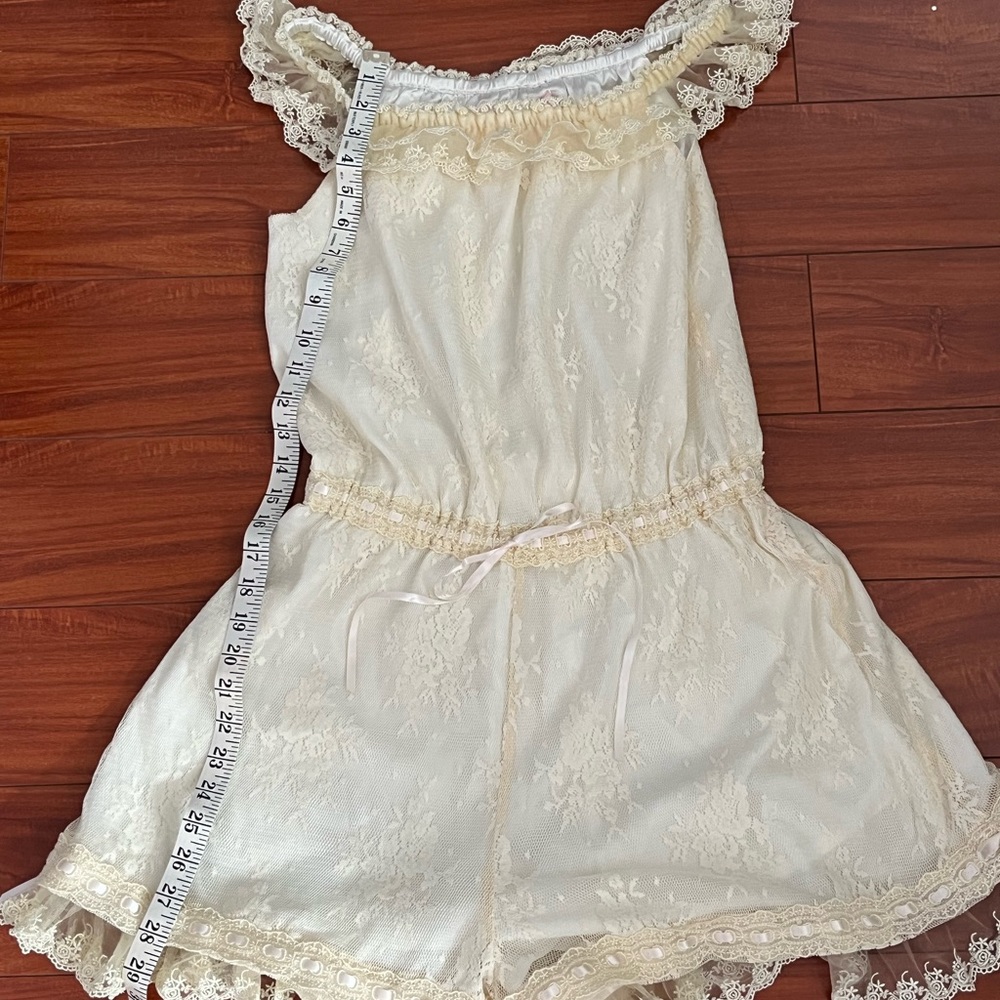 Lolita lace jumpsuit with ribbon detail